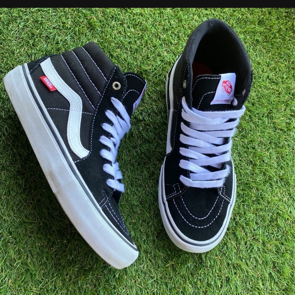 High top vans, black & white. Size 8.5 women’s. Perfect condition